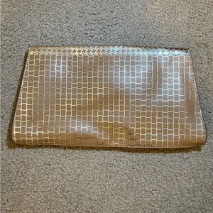 Metallic gold clutch handbag